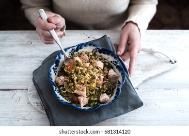 Woman Eating A Salad With Chicken And Beans For White Table Horizontal