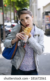 Woman Eating A Sandwich