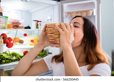 Woman Eating Sandwich