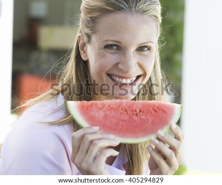 Similar – Foto Bild schöne Frau isst Wassermelone drinnen