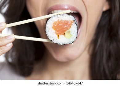 Woman Eating Sushi