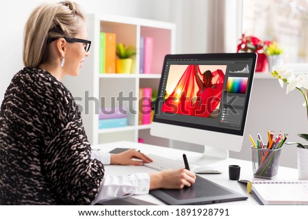 Woman editing photo on computer