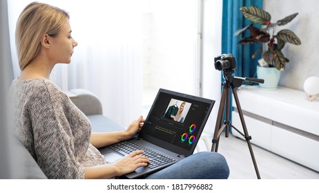 Woman Editing Video On Laptop Computer For Her Vlog. Woman Working On Laptop At Home