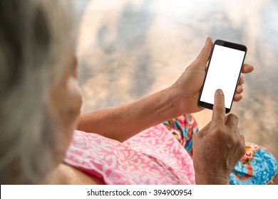 Woman Elderly Using A Smart Phone.