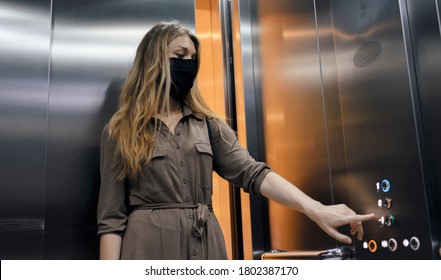 Woman in the elevator with protective face mask - Powered by Shutterstock