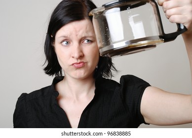 Woman With Empty Coffee Pot