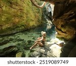 woman in the enchanted well, in Chapada das Mesas, Maranhão