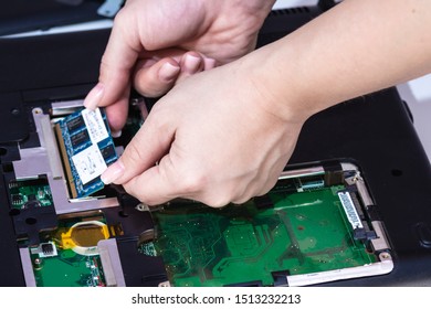 Woman Engeneer Installing Computer Memory