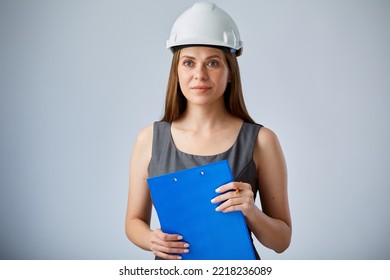 Woman Engineer In White Construction Hardhat Holding Clipboard. Isolated Female Worker Portrait.