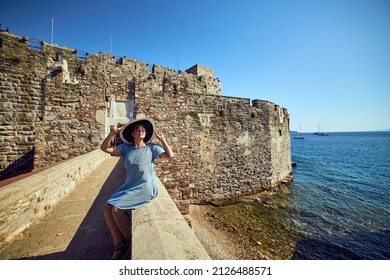 Woman Enjoying The Amazing View In Bodrum Castle. Summer Holiday In Turkey