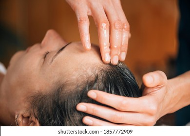 Woman Enjoying Ayurvedic Oil Treatment For Healthy Hair