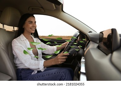 Woman enjoying driving car feeling tea leaves scent from ventilation, closeup. Air freshener