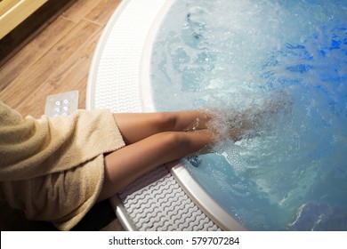 Woman Enjoying Jacuzzi Relaxation At Spa Resort