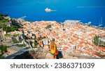 Woman enjoying panoramic view of Nafplio city in Greece