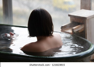 Woman Enjoys Bath At Hot Springs In Japan