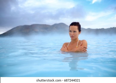 Woman Enjoys Spa In Geothermal Hot Spring