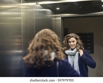 Woman Entering The Elevator
