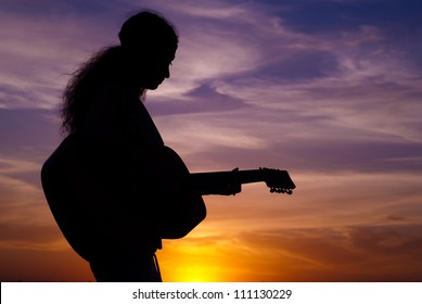 Woman In The Evening With Gitar