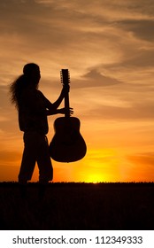 Woman In The Evening With Gitar