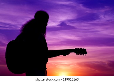 Woman In The Evening With Gitar