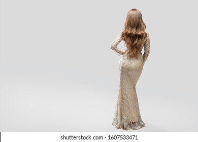 Woman Evening Sparkling Dress Back Rear View, Elegant Fashion Model In Beautiful Gown, Beauty Studio Portrait