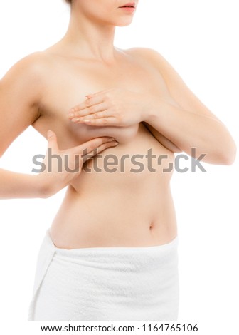Woman examining breast isolated on white background 