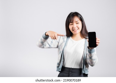 Woman Excited Pointing Finger To A Smartphone Screen Studio Shot Isolated White Background, Happy Young Female Smiling Showing Something Product On Mobile Phone Screen