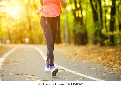 Woman exercise walking outdoors, shoes closeup