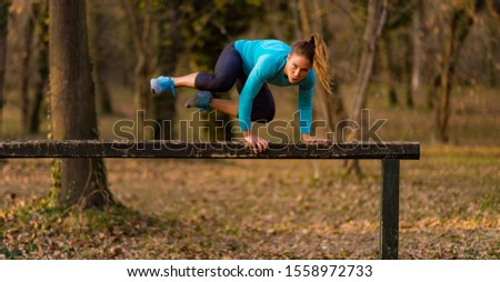 Similar – Image, Stock Photo Young man exercising outdoors in a forest