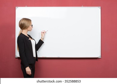 Woman Explain At The Whiteboard. Girl Student