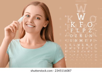 Woman with eye drops and test chart on beige background - Powered by Shutterstock