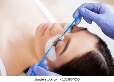Woman Eye with Long Eyelashes. Beautiful Young Woman During Eyelash Extension - Shutterstock ID 1385874050