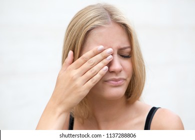 Woman With Eye Problems Outside