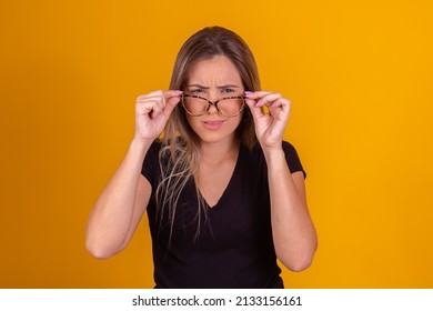 Woman With Eyeglasses Having Trouble Seeing