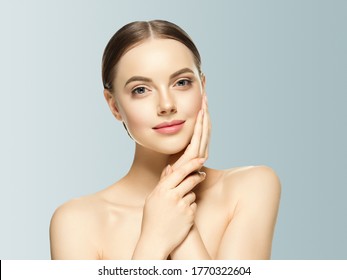 Woman face beauty hand touching   healthy skin natural makeup beautiful female gray background - Shutterstock ID 1770322604
