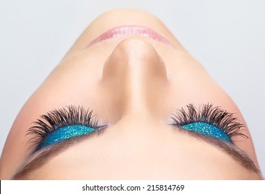 Woman Face With Blue Shining Eye Make-up 