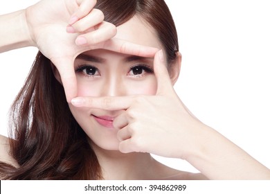 Woman face and eye care and she making frame with hands, asian woman
