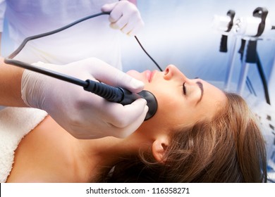 Woman Face Treatment In Medical Spa Center