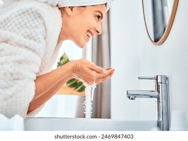 Woman, face and wash with water for skincare, natural beauty, healthy skin and wellness in bathroom. Girl, happy and facial clean in home with mirror for reflection, dermatology and self care - Powered by Shutterstock
