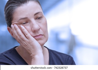 Woman Falling Asleep In The Office. Tiredness Because Of Sleep Apnea, Fibromyalgia Or Chronic Fatigue Syndrome, Cfs.