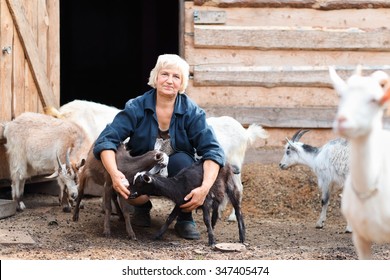 Woman Farmer With Goats