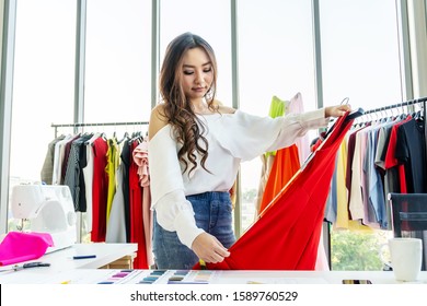 Woman fashion designer using tape for measuring mannequin creating pret-a-porter collection in showroom, concentrated owner of fashion industry business working in atelier on tailoring samples - Shutterstock ID 1589760529