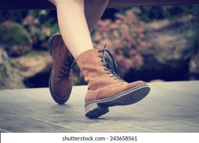 Woman With Fashion Leather Boots