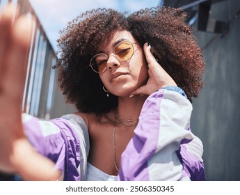 Woman, fashion and selfie with social media in city with influencer, style and retro clothes outdoor. Afro, profile picture and confidence of African person with creativity and cool jacket with pose