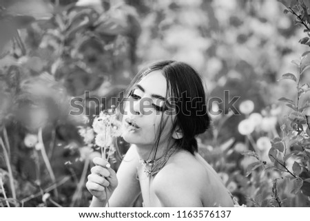 Similar – Woman posing in field of white flowers