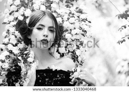 Similar – Portrait of woman in with red flower