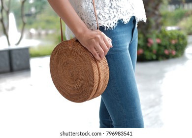 Woman With Fashionable Rattan Bag