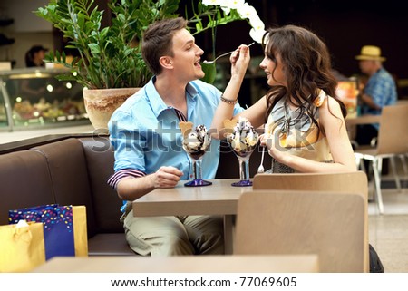 Woman feeding her husband