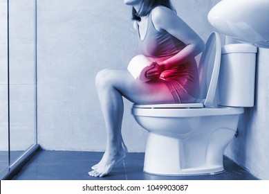 Woman Feel Pain With Constipation In Wc