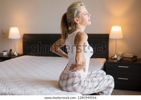 Woman Feeling Back Pain After Sleeping Stock Photo Edit Now